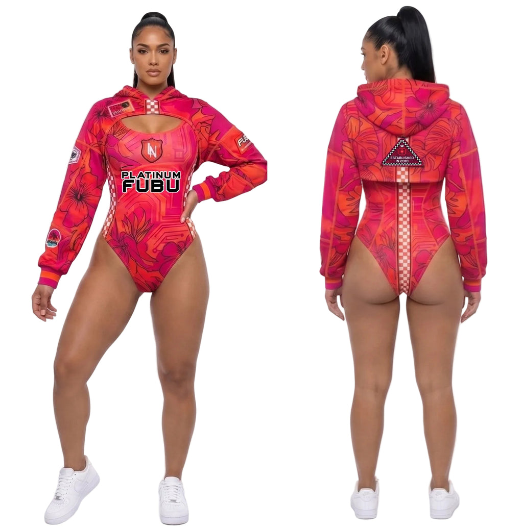 Woman wearing a red and pink FUBU swimsuit with matching hoodie on a white background