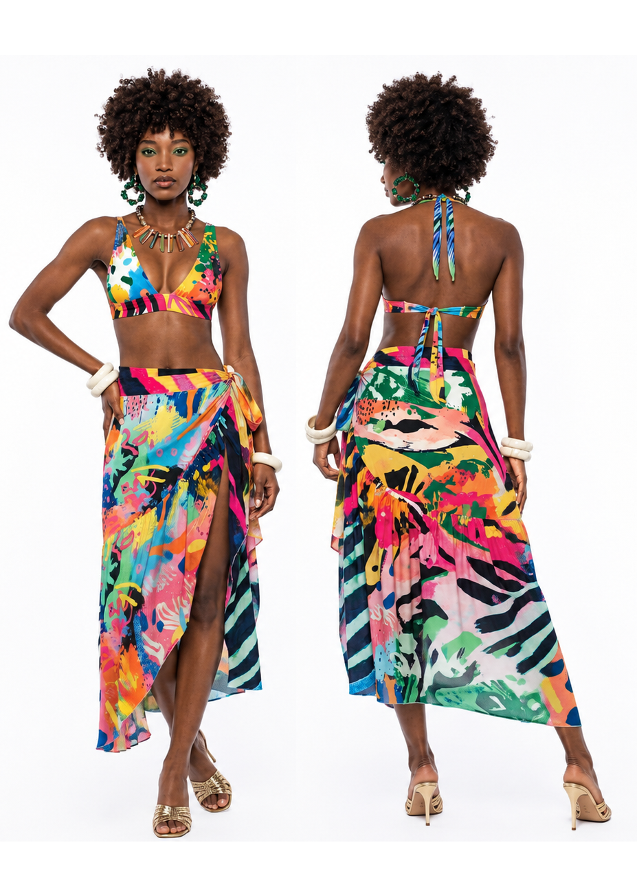 A model is shown from both the front and back wearing a vibrant, multicolored two-piece set consisting of a halter bikini top and a matching high-waisted wrap skirt with a tropical print.